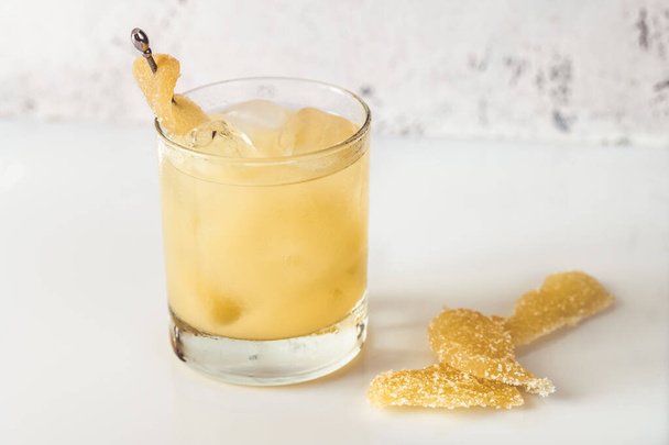Glass of Penicillin cocktail on white background - Photo, Image