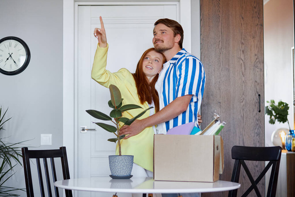 portrait of happy new home owners discussing - 写真・画像