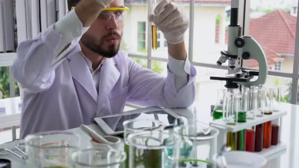 Scientist work with science equipment in laboratory. Scientific research concept - Filmati, video
