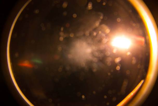 Solar lens flare on black background - Photo, Image