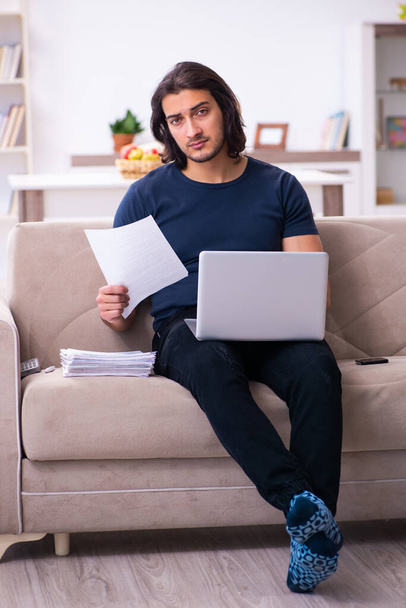 Young man employee working from house - Photo, Image