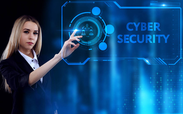 Business, Technology, Internet and network concept. Young businessman working on a virtual screen of the future and sees the inscription: Cyber security - Photo, image
