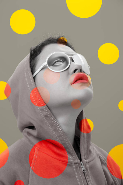 Art collage with alternative funky girl. Close up fashion portrait young beautiful woman in hoodie and white strange glasses with eye. Multi-colored circles. Unusual youth fashion concept. - Foto, immagini