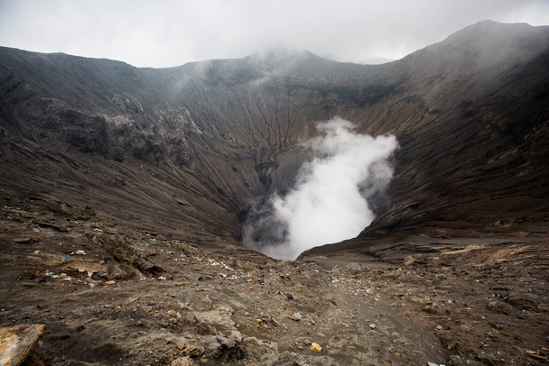 View to caldera of Bromo volcano on cloudy day, Java, Indonesia - Фото, зображення