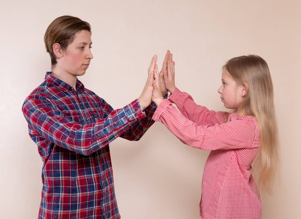 Young boy and girl brother and sister clapping their hands - Photo, Image