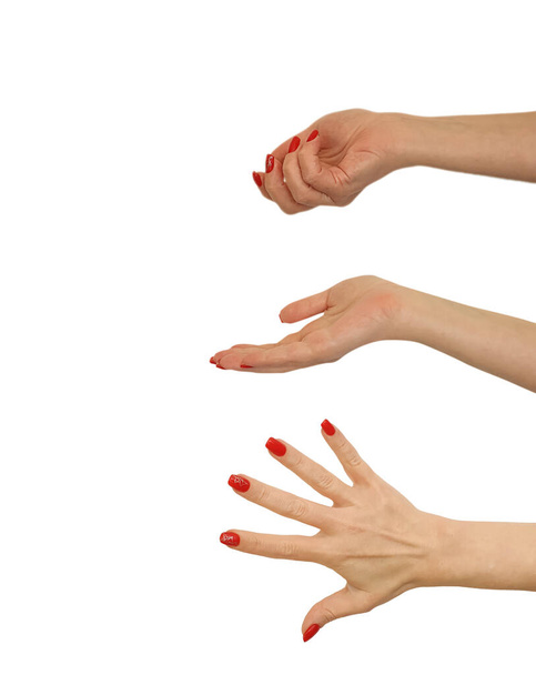 żeński ręka czerwony manicure izolowane na białym tle - Zdjęcie, obraz