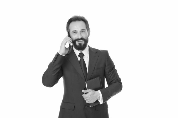 Phone call. Businessman talk on mobile phone. Bearded man use cell phone. Business communication. 3G. 4G. Mobile lifestyle. New technology. Formal work fashion. Phone for professional use - Fotó, kép