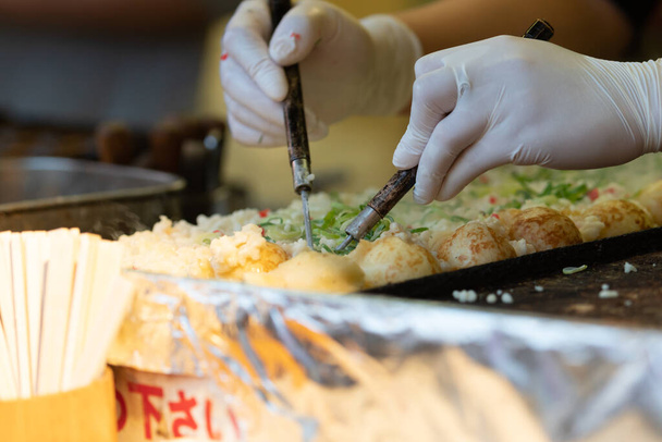 Такояки - самая известная японская закуска в Японии. - Фото, изображение