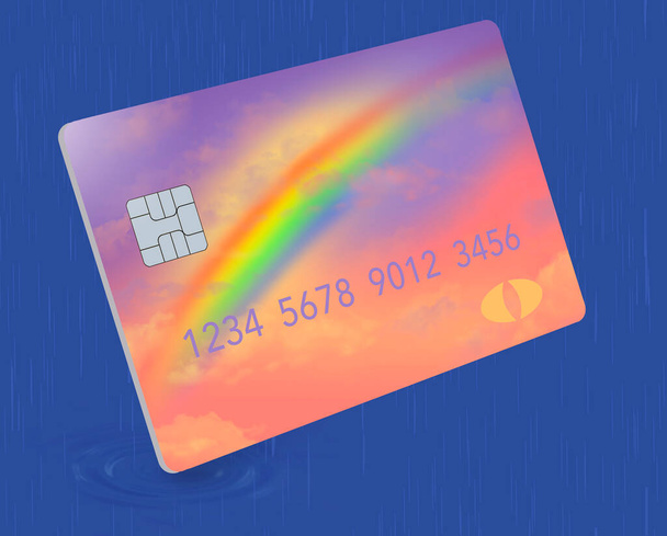 Aquí hay una tarjeta de crédito que tiene un diseño de arco iris y colores y se va a utilizar en un día lluvioso. Es para emergencias financieras.  - Foto, Imagen