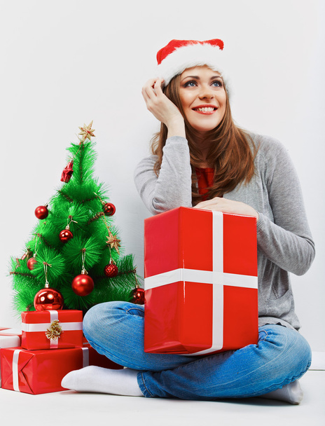 Christmas Santa woman with christmas gift. - Фото, зображення
