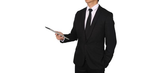 Επιχειρηματίας κρατώντας ένα touch screen pad απομονώνονται σε λευκό φόντο. - Φωτογραφία, εικόνα