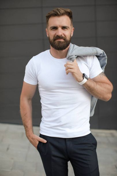 Portrait of a casual man with beard outdoor - Fotografie, Obrázek