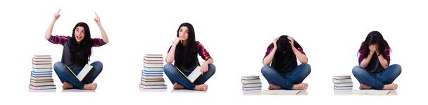 Joven estudiante con libros aislados en blanco - Foto, imagen