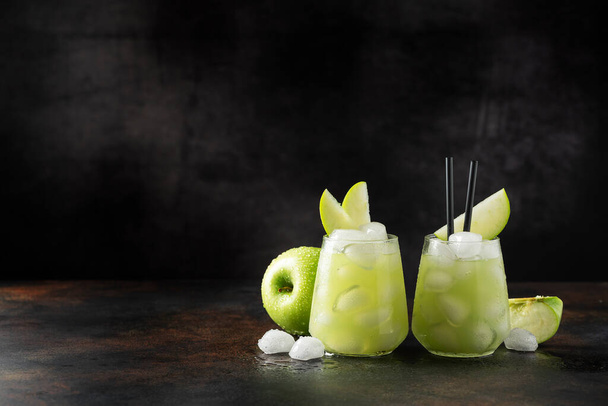 Summer cocktail with green apple and ice. Selective focus image with copy space - Foto, Imagem