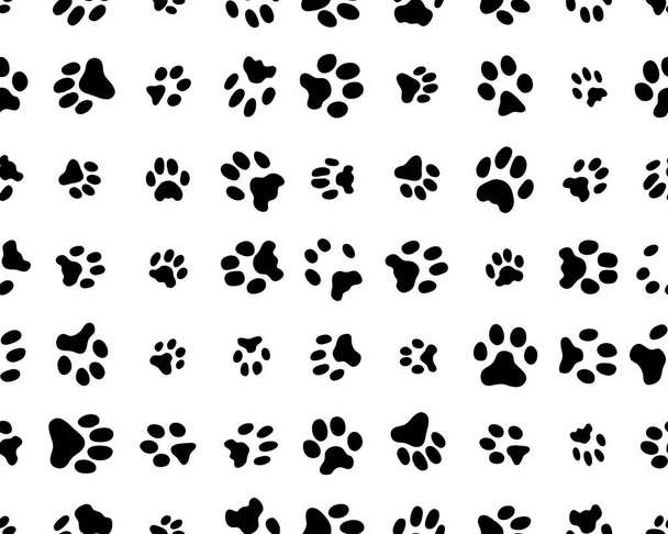Zökkenőmentes minta lábnyomokkal macskák fehér háttér - Vektor, kép