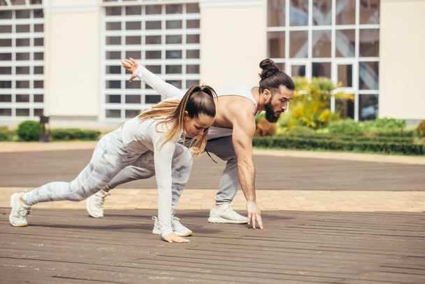 Happy Couple Exercising In Park - Photo, Image