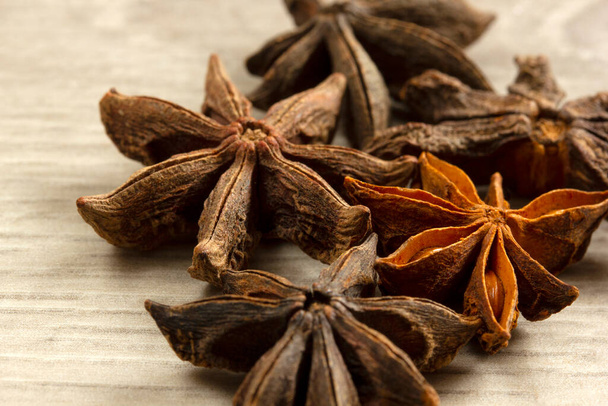 Star anise exotic spice on a wooden table - Photo, Image