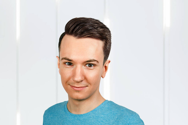 Young guy with pompadour haircut, real photo hair for barbershop old fashioned. - Фото, зображення