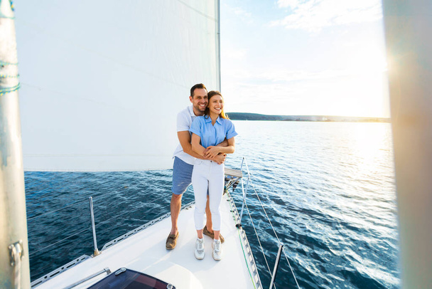 Couple Hugging On Yacht Spending Honeymoon Sailing Across The Sea - Fotoğraf, Görsel