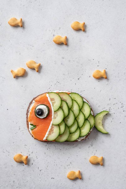Funny salmon sandwich for kids lunch - Zdjęcie, obraz