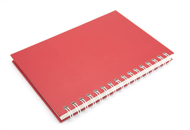 Notebook espiral vermelho isolado no fundo branco
 - Foto, Imagem