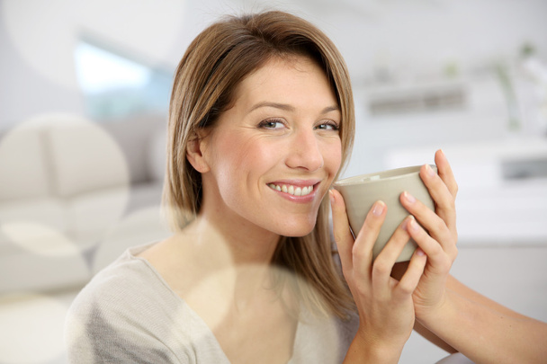 Woman drinking tea - Photo, image