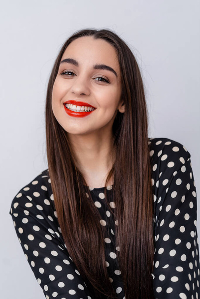 Beautiful young pretty woman, model, girl with red lips. Girl looking at camera, smiling. - Foto, Imagen