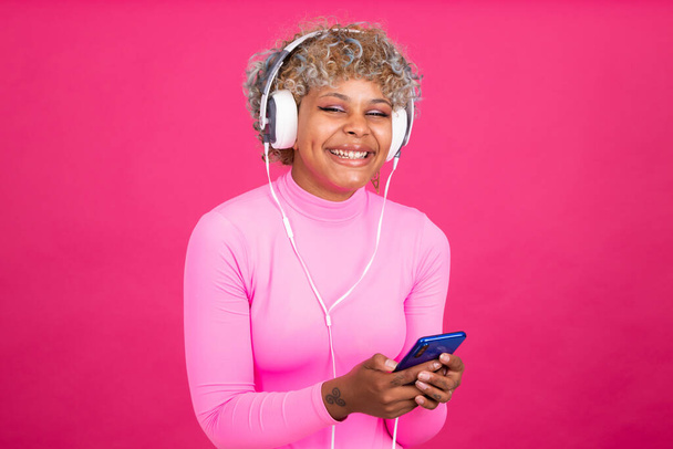 isolated girl with headphones and mobile phone listening to music - Photo, Image