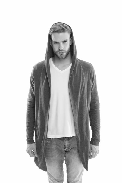 Trend setter is here. Serious guy isolated on white. Handsome guy in casual style. Unshaven guy wear hood. Fashion look of modern guy. Menswear store. Fashion and style - Foto, Bild