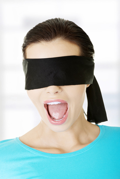 Portrait of the young woman blindfold - Foto, Bild