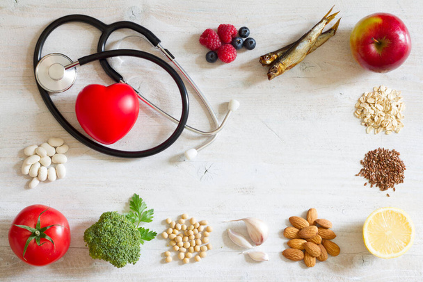 Selection food good for heart with stethoscope, healthy diet concept - Valokuva, kuva