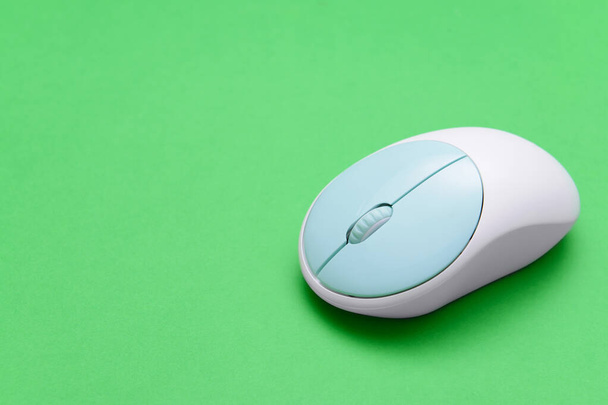 Modern computer mouse on color background - Photo, Image