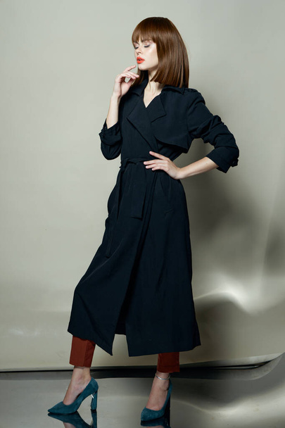 Fashionable model cloak photo studio modern style Beautiful face - Photo, Image