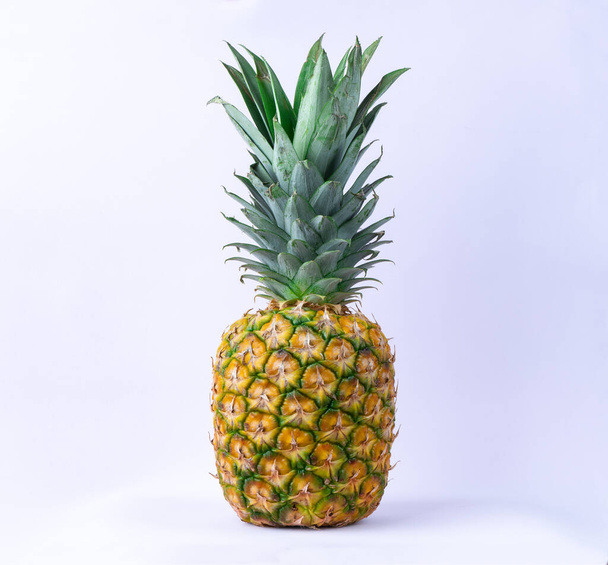Photo of ripe pineapple on white background - Фото, зображення