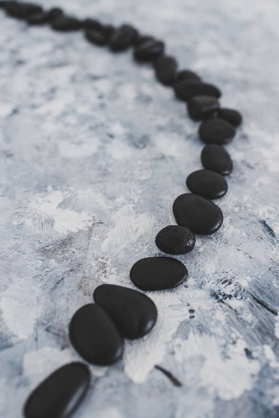 mental health concept, meditation inspired image with zen pebbles on grey concrete surface	 - Фото, зображення