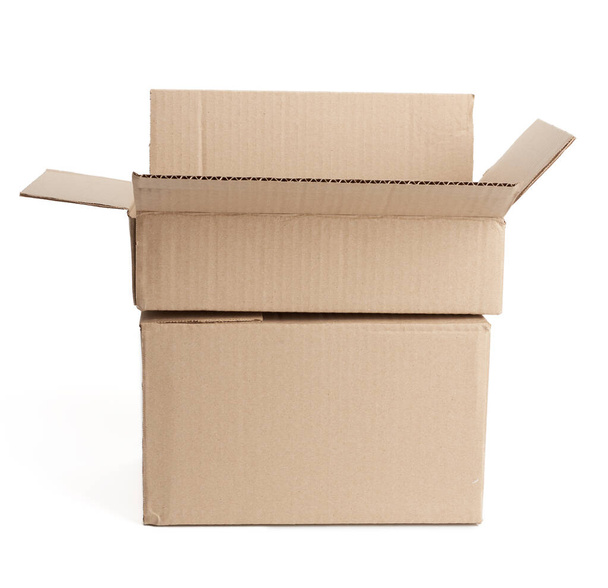 open empty brown rectangular cardboard box for transporting goods isolated on white background, - Foto, Bild