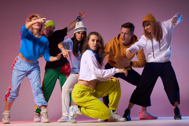 Group of young hip-hop dancers in studio - Valokuva, kuva