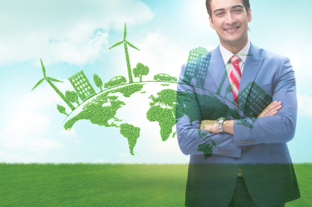 Зеленая энергия и экология концепция с бизнесменом
 - Фото, изображение