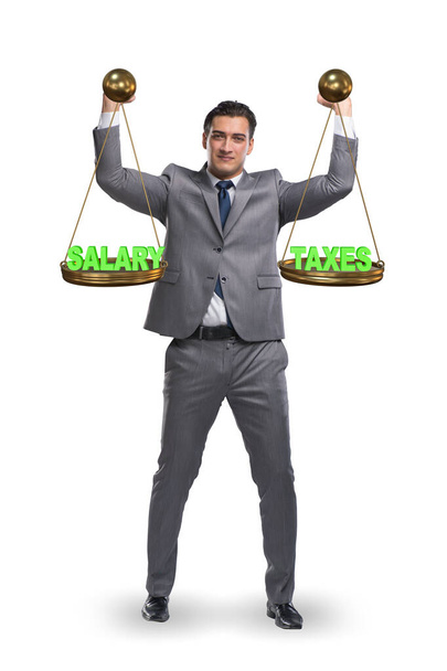 Businessman trying to find balance between taxes and salary - Photo, Image