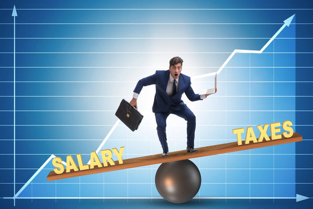 Az üzletember egyensúlya az adók és a fizetés között - Fotó, kép