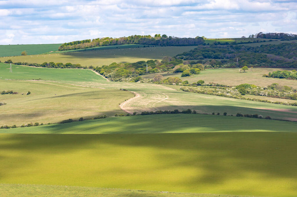 A green South Downs landscape with shadows from clouds over the fields - Valokuva, kuva
