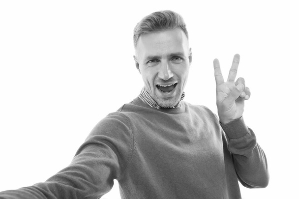 Fight for your victory. Happy man show victory sign isolated on white. Excited guy celebrate victory. Victory or peace hand gesture. Success and triumph. Positivity and joy - Foto, Bild