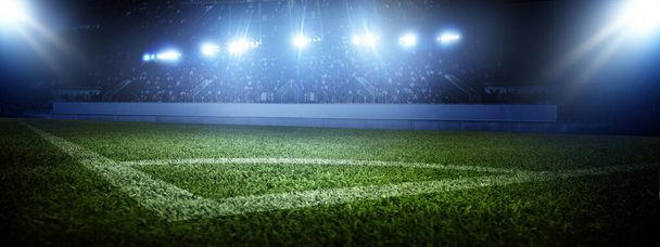 Fußballstadion, glitzerndes Licht, Blick vom Spielfeld. Fußballkonzept - Foto, Bild