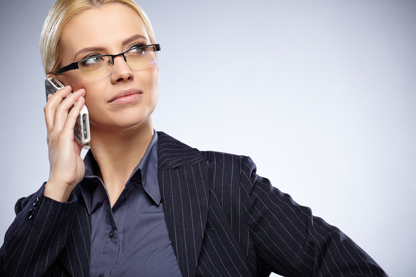 Businesswoman with cell phone - Photo, image