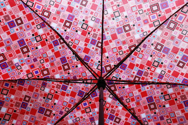 Geometrical design of an umbrella shot from below. - Valokuva, kuva