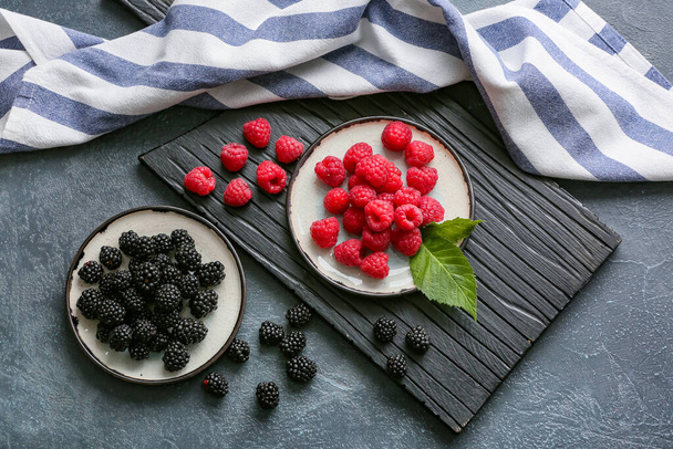 Tasty fresh berries on dark background - Photo, Image