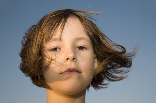 Portrait of little girl - sear in the wind - Фото, зображення