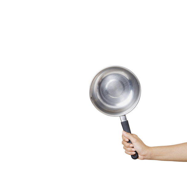 vrouw met steelpan voor kooklessen op witte achtergrond - Foto, afbeelding