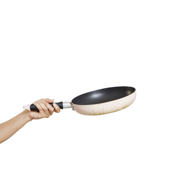 Пан фри с рукой на белом фоне посуда кухня для приготовления пищи - Фото, изображение