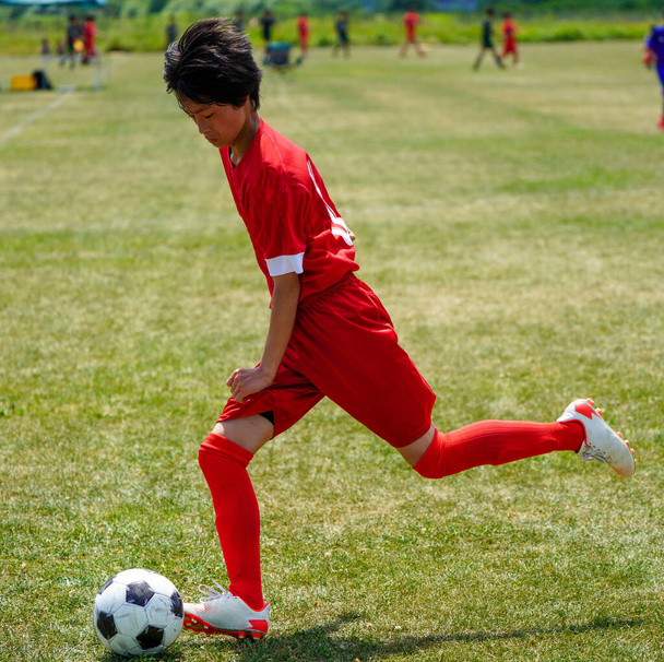 jalkapallo peli hokkaido Japani - Valokuva, kuva